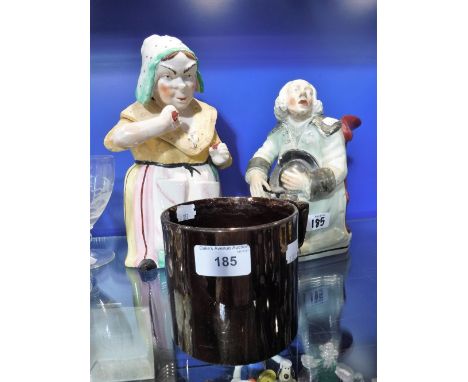 A STAFFORDSHIRE TOBY JUG in the form of George Whitefield with his lamp and one other jar in the form of a lady and a lustre 