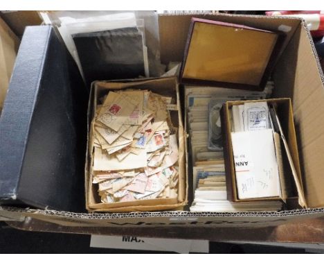 A COLLECTION OF STAMPS AND FIRST DAY COVERS including rolls of unused stamps, cut stamps and post marks and an album containi