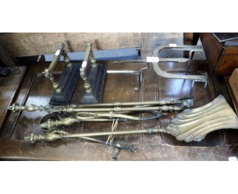 A SET OF VICTORIAN BRASS FIRE TOOLS,  a pair of similar stands and a trivet  