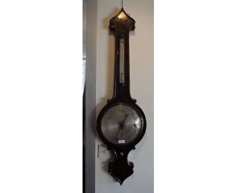 A REGENCY ROSEWOOD WHEEL BAROMETER, inscribed, 'A Tagliabue & F Ciceri, 31 Brooke Street Holborn London', 44" high