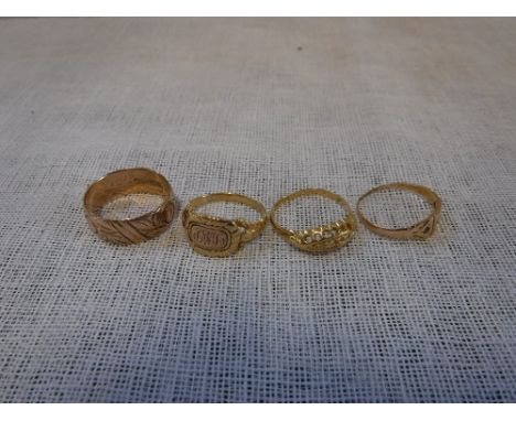 A YELLOW METAL MEMORIAL RING, engraved with initials and inscription 'Died 17 Aug. 1828 aged 30' and three other gold 9ct and