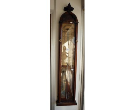 A VICTORIAN 'ADMIRAL FITZROY'S' BAROMETER  in a glazed walnut case, 46" high 