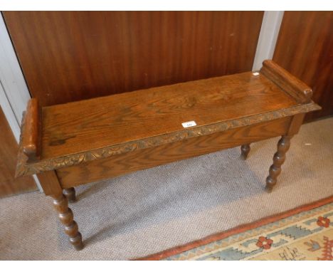 A VICTORIAN OAK HALL BENCH with carved decoration, 36" long