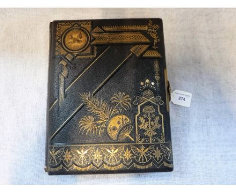 A VICTORIAN TOOLED LEATHER BOUND MUSICAL PHOTOGRAPH ALBUM, playing  two airs, including 'Are We to Part Like This, Bill?'