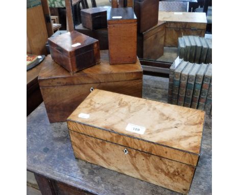 A 19TH CENTURY WALNUT VENEERED TEA CADDY with fitted interior, a mahogany veneered tea caddy and two other wooden boxes