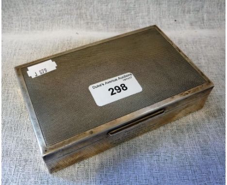 AN EDWARDIAN STYLE SILVER CIGARETTE BOX with engine-turned decoration and wood-lined interior, bearing presentation inscripti