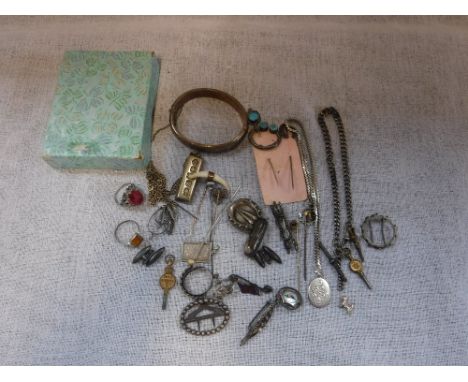 A SILVER GILT INGOT PENDANT, a silver Albert watch chain, a silver gilt bangle with engraved decoration and other items