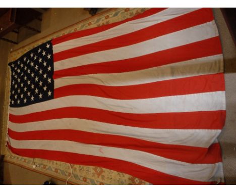 A LARGE VINTAGE AMERICAN 'STARS & STRIPES' FLAG, 116" long