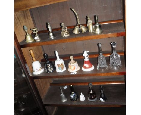 A COLLECTION OF HAND BELLS in ceramic and metal