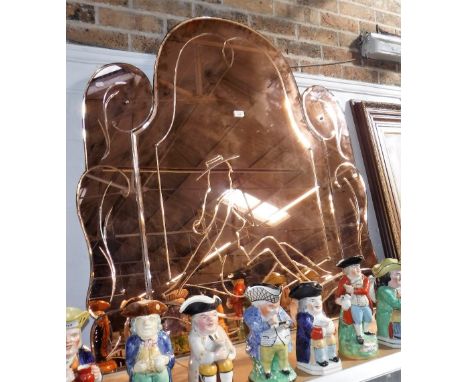 A VINTAGE 1950'S PINK MIRROR, decorated with a seated woman wearing a hat, 45.5" high x 44" wide