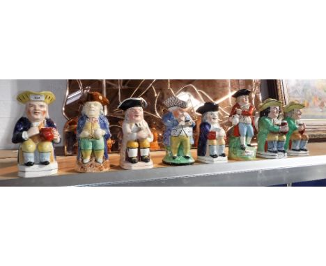 A COLLECTION OF VARIOUS CERAMIC TOBY JUGS including 19th century and later, each polychrome painted  (8)