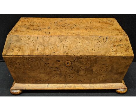 A late 19th/early 20th century burr walnut veneered tea caddy, raised on four bun feet, twin brass handles, L.35cm