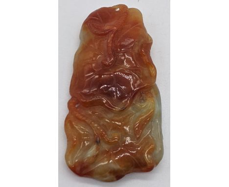 A Chinese jade carving in the form of lilley pads, L 6.5cm