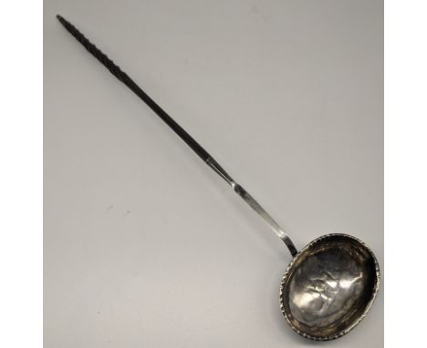 A George III silver toddy ladle, twisted bone handle, hallmarked London 1781, maker Thomas Morley, monogram to underside