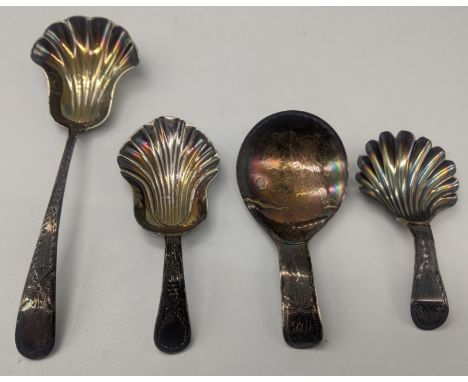 Four George III silver caddy spoons, various hallmarks