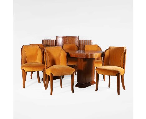 Art Deco, a walnut dining suite comprising:a dining table,c.1930s, the top over a curved base,184cm long91cm wide82.5cm high,