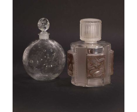 René Lalique (French, 1860-1945), a 'Dans La Nuit' scent bottle, designed in 1924 for Worth, clear glass, with relief-moulded