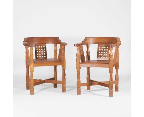 ▲ Robert 'Mouseman' Thompson (1876-1955), a pair of oak 'Monk' elbow chairs, each with a carved lattice back, raised on an 'X