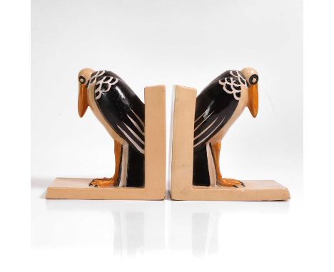 Art Deco, a pair of marabou stork bookends, c.1930, French, glazed earthenware, with painted marks 'H F D 1384 France', 17.5c