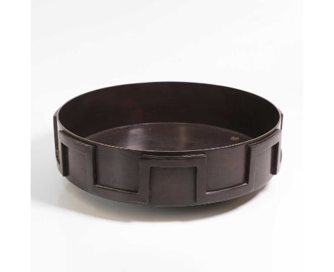 Art Deco, a bronze bowl, with a geometric band, 41cm diameter12.5cm highCondition ReportThere are scratches, marks, chips and