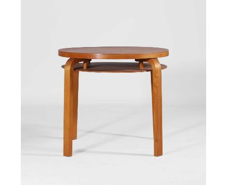 Alvar Aalto (Finnish, 1898-1976) for Finmar, a model '70' coffee table, designed in 1933, the circular Karelian birch top ove