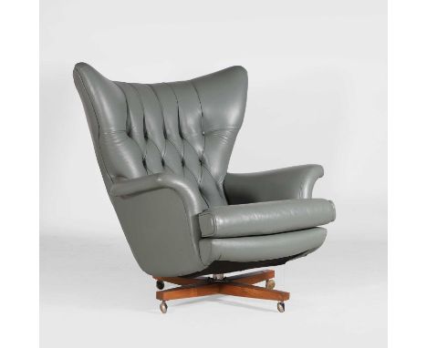 Paul Conti for G Plan, a 'Blofeld' swivel leather armchair, model '6250', mid-20th century, on an oak base with metal castors