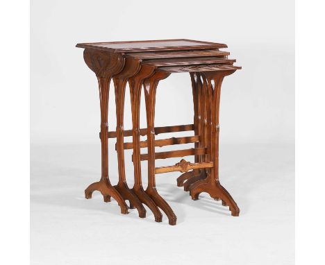 Émile Gallé (French, 1846-1904), an Art Nouveau nest of four tables, c.1900, with carved tracery legs, each rectangular top w
