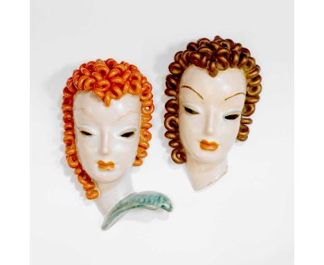 Rudolf Knörlein (Austrian, 1902-1988) for Goldscheider, two pottery wall masks, c.1930, each modelled as a lady with curled h
