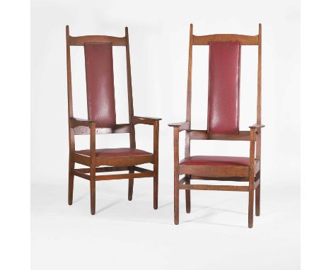 Charles F A Voysey (1857-1941), a pair of oak 'Essex' armchairs, c.1900, designed for the Essex &amp; Suffolk Equitable Insur