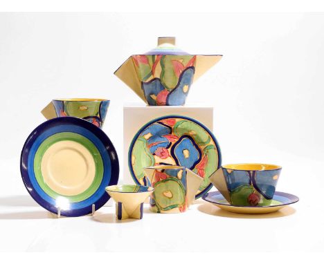 Clarice Cliff (1899-1972), a 'Blue Chintz' pottery tea service, c.1930, 'Conical' shape, comprising a teapot, cream jug, suga