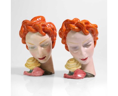 Goldscheider, a pair of pottery standing masks modelled as a woman with red hair,each 25cm high (2)Condition ReportStructural