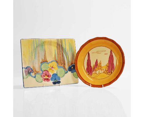 Clarice Cliff (1899-1972),  two pottery plates, c.1930, a 'Delecia Pansies' Biarritz plate, and a circular plate decorated wi