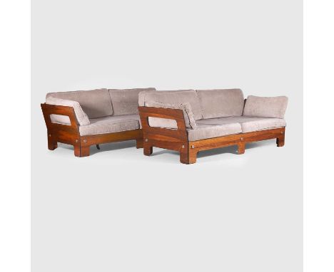§ Sigurd Ressell (Norwegian, 1920-2010),  a pair of rosewood sofas, c.1960, upholstered in grey fabric, 203cm wide 90cm deep 