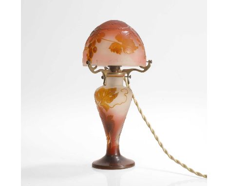 Émile Gallé (French, 1846-1904), a cameo glass lamp, early 20th century, cased and acid-etched with foliate motifs, cameo 'Ga