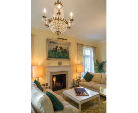 A PAIR OF BRASS BALUSTER LAMPS 58cm high, with cylindrical shades (2)From The Estate of John Whitwell MS, FRCS, 'Bagatelle', 