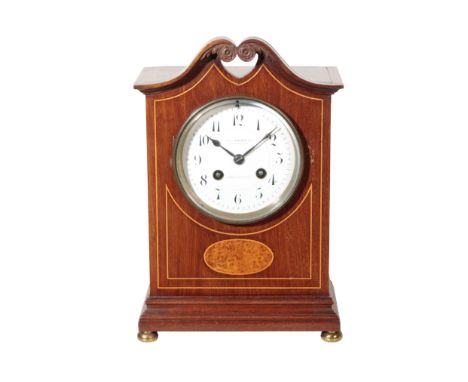 A MAHOGANY MANTEL CLOCK by John Walker, New Bond Street, the white enamel dial with Arabic numerals, 27.5cm highThe estate of