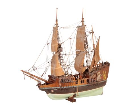 HMS UNICORN: A MODEL OF A BRITISH THREE MASTED MAN O'WAR with painted heraldic emblems to the side, 84cm high x 105cm longThe