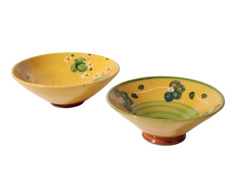 A PAIR OF STUDIO CERAMIC AMBIANCE AUBAGNE KAOLIN YELLOW GLAZED BOWLS with printed mark, 24cm; and another studio ceramic bowl