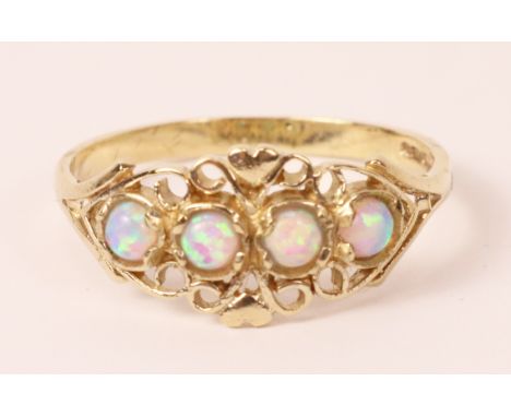 9ct gold four stone opal ring hallmarked   Condition Report   Click here for further images, condition, auction times & deliv