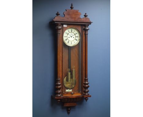 Late 19th century walnut Vienna style wall clock, enamel dial with subsidiary seconds dial, eight day movement striking on co