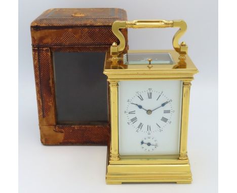 A 19thC. brass repeater carriage clock with original travel case & key, not running as should, winds, but doesn't run, issue 