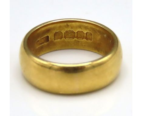 A 22ct gold band, 9.5g, size K/L