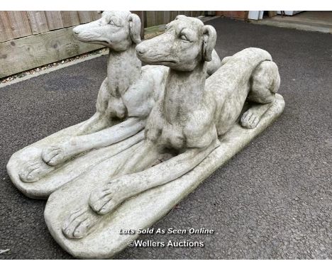 PAIR OF STONE RECUMBENT GREYHOUNDS, 40CM H X 82CM (L) / ITEM LOCATION: GUILDFORD, GU14SJ (WELLERS AUCTIONS)