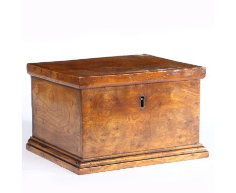A well-figured elm board box  The one-piece lid with simple applied narrow edge moulding, plain sides and applied ovolo-mould