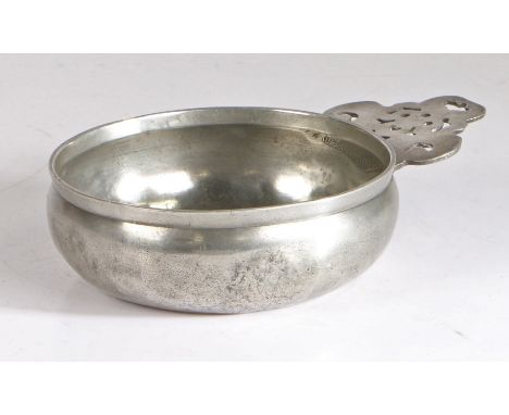 A William III/Queen Anne pewter porringer, possibly Wigan/Bewdley, circa 1700  Having a bellied bowl, bossed base, triangular