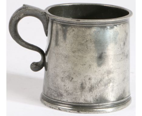 A George II/III pewter mug, circa 1740-70  Of squat, straight-sided form, with lip and reeded footrim, the tongued and hollow