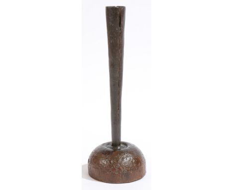 An unusual George III iron and wooden candleholder, circa 1770-1800  Having an iron tall, conical rolled, candle socket, on o