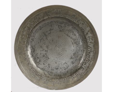 An impressively large Charles II pewter multiple reeded and hammered all-over charger, circa 1680  Having indistinct hallmark