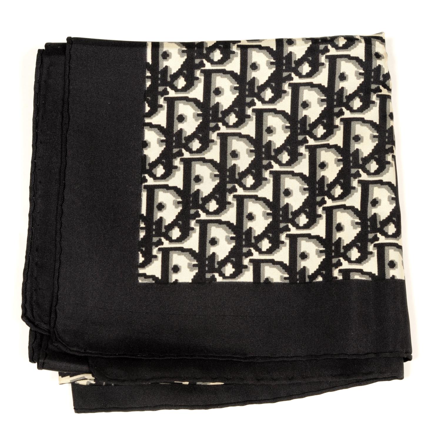 CHRISTIAN DIOR - a silk scarf. Featuring the maker's classic monogram ...