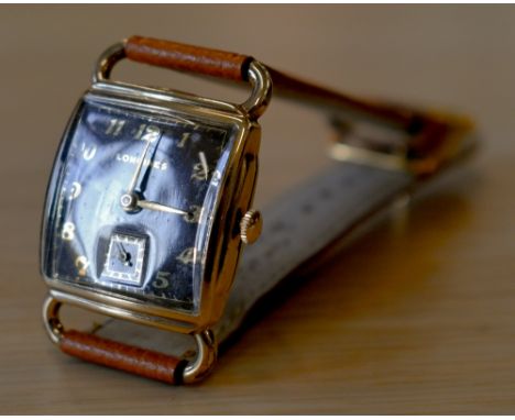 A manual vintage gents Longines gold plated wristwatch, the brown enamel square dial with gilt hands, Roman numerals and seco